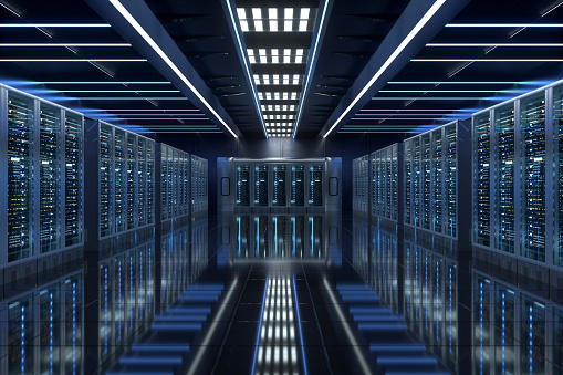 Modern data center aisle with high-density server racks and cool blue lighting